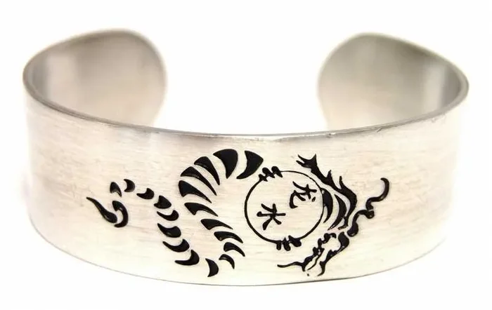 Armspange mit Drachen-Motiv