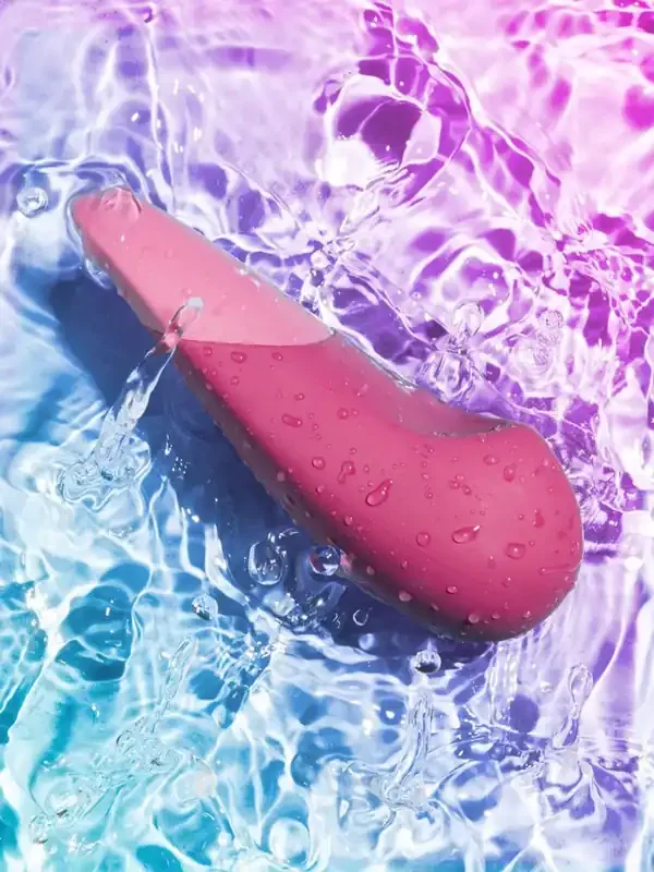 Womanizer Vibe Klitorisstimulator, pink